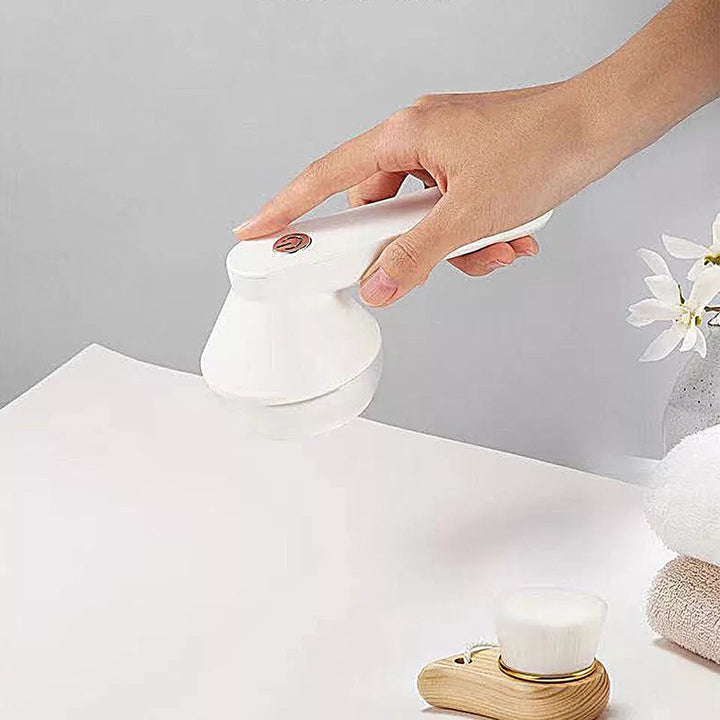 Portable fabric shaver for furniture & upholstery, revitalizing textiles & removing lint.