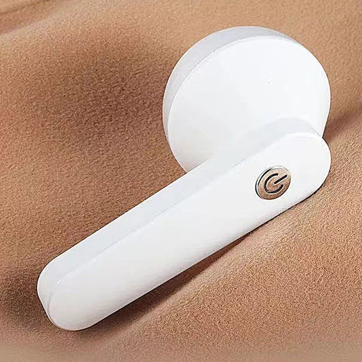 Compact cordless defuzzer, perfect for quick garment care, keeping sweaters and fabrics smooth.