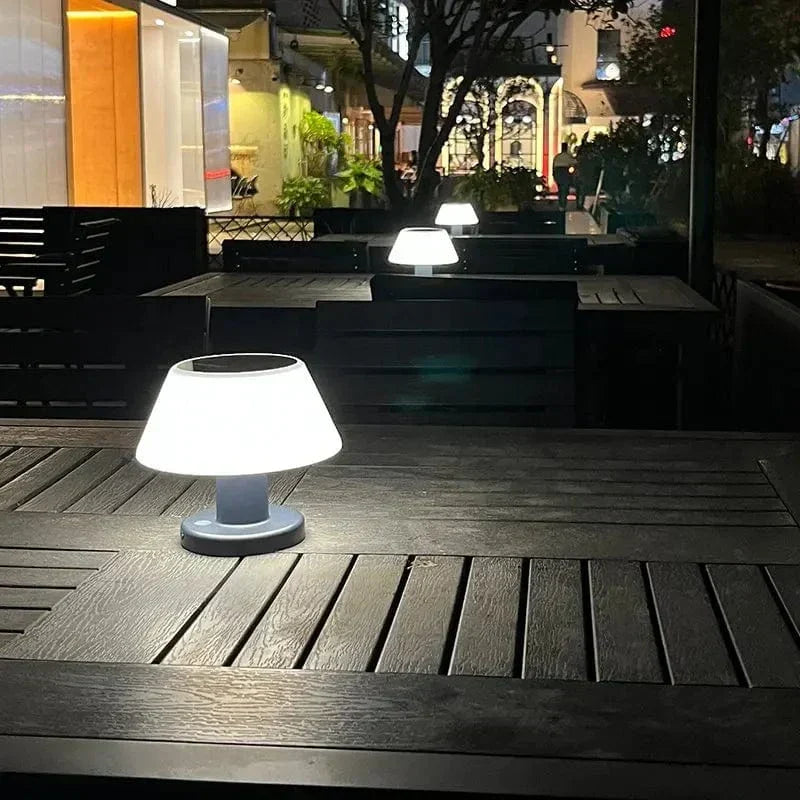 Cordless solar table lamp with LED, rechargeable via USB Type-C, features a sleek, minimalist design, perfect for outdoor use