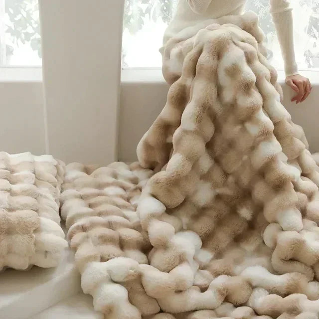 Fluffy faux fur throw blanket, incredibly soft & cozy for living rooms or travel comfort.