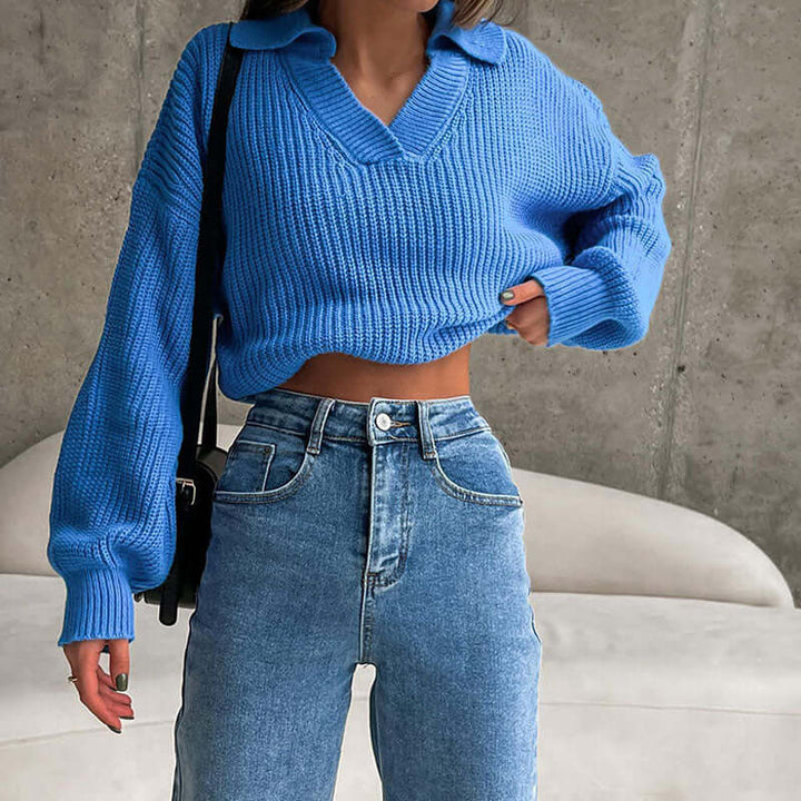 Elegant women's knitted sweater, timeless design for casual or dressed-up looks, offering cozy comfort.