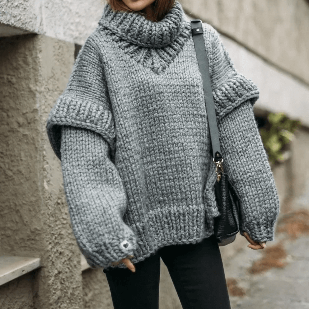 Cozy oversized women's knit turtleneck sweater in a warm winter shade, perfect for casual comfort.