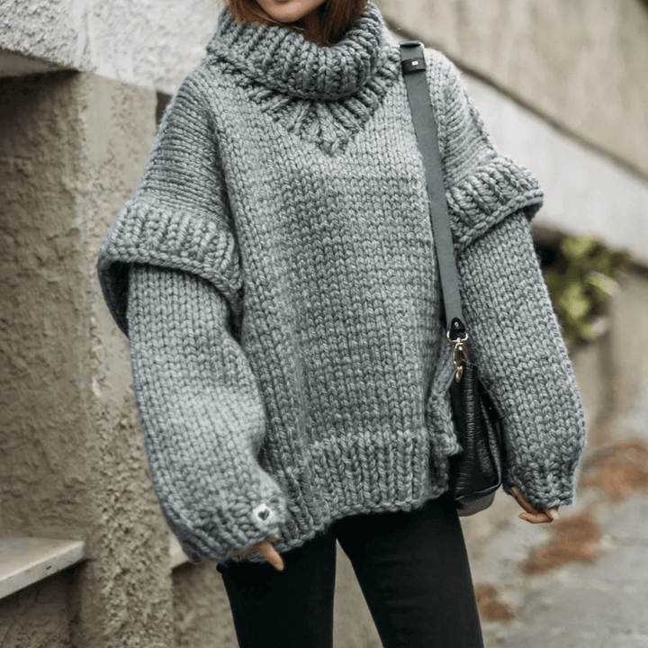 Cozy oversized women's knit turtleneck sweater in a warm winter shade, perfect for casual comfort.