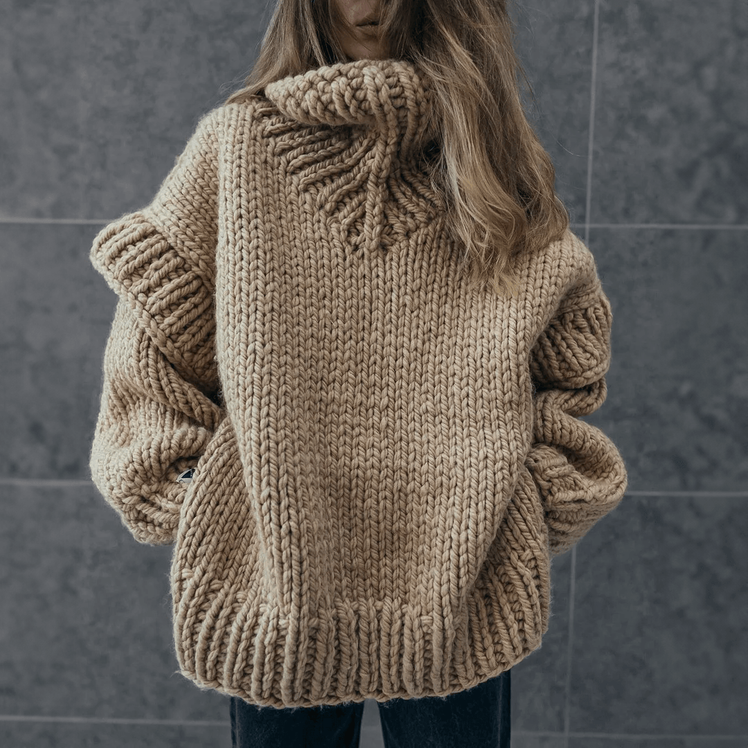 Stylish women's oversized turtleneck sweater with long sleeves, ideal for warm fall fashion and casual wear.