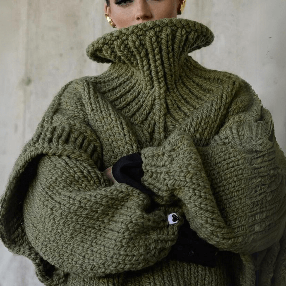 Warm knit women's oversized turtleneck sweater, offering ultimate cozy comfort for chilly winter days.