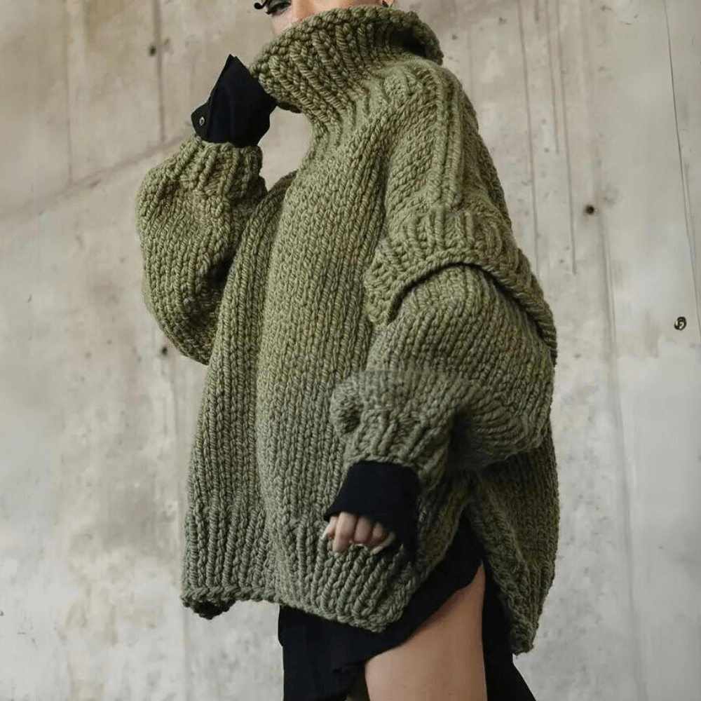 Comfortable women's oversized long sleeve turtleneck sweater, a warm knit essential for everyday winter wear.
