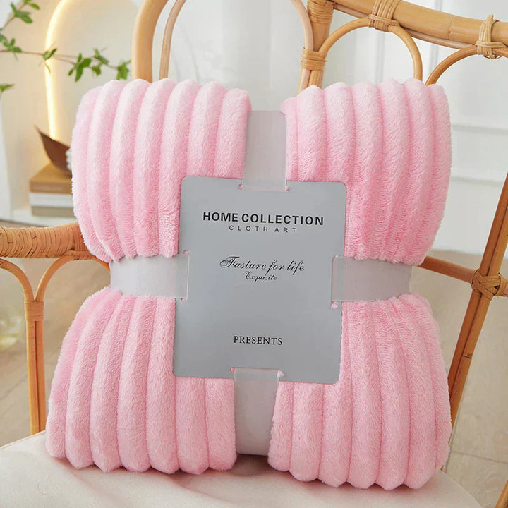Soft, warm wide-stripe fleece blanket. Ideal plush throw for bedroom or sofa, adding comfort & style.