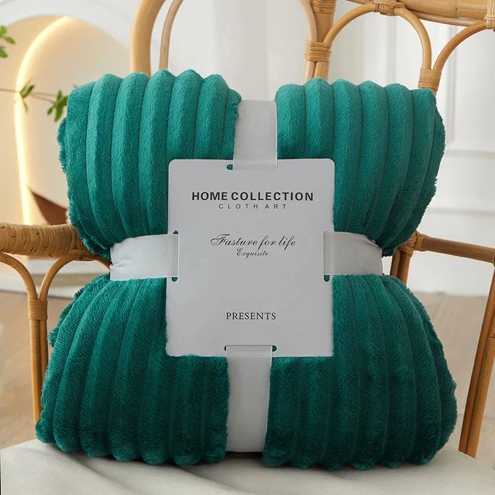 Plush wide-stripe fleece blanket, a super soft & warm throw for ultimate comfort in any room.