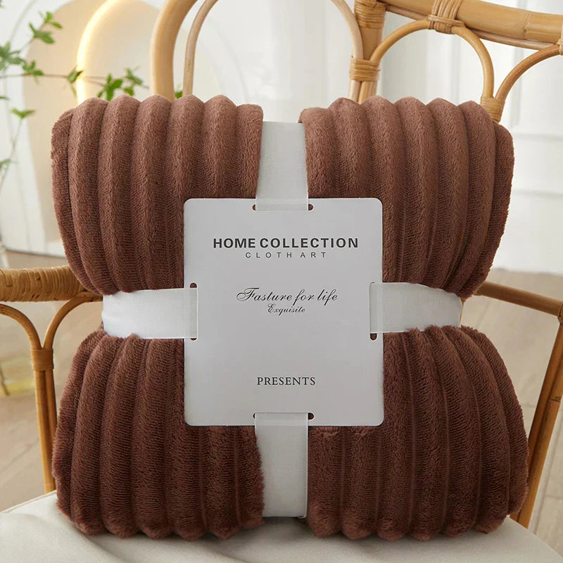 Stylish wide-stripe plush fleece blanket, a warm & soft throw for modern home decor and relaxation.