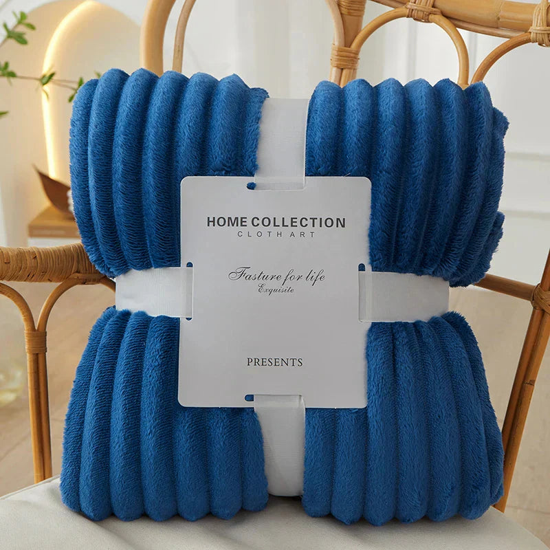 Home decor wide-stripe fleece blanket, a plush, soft, and warm throw for bedroom or living room.