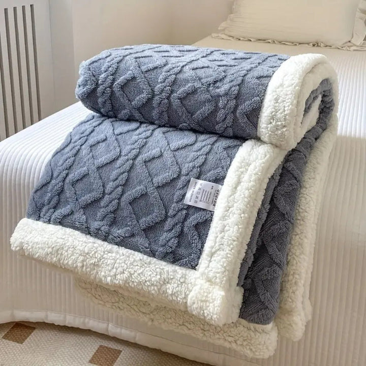 Luxurious diamond knit sherpa throw, soft and warm fleece for a cozy living room or comfortable bedding.