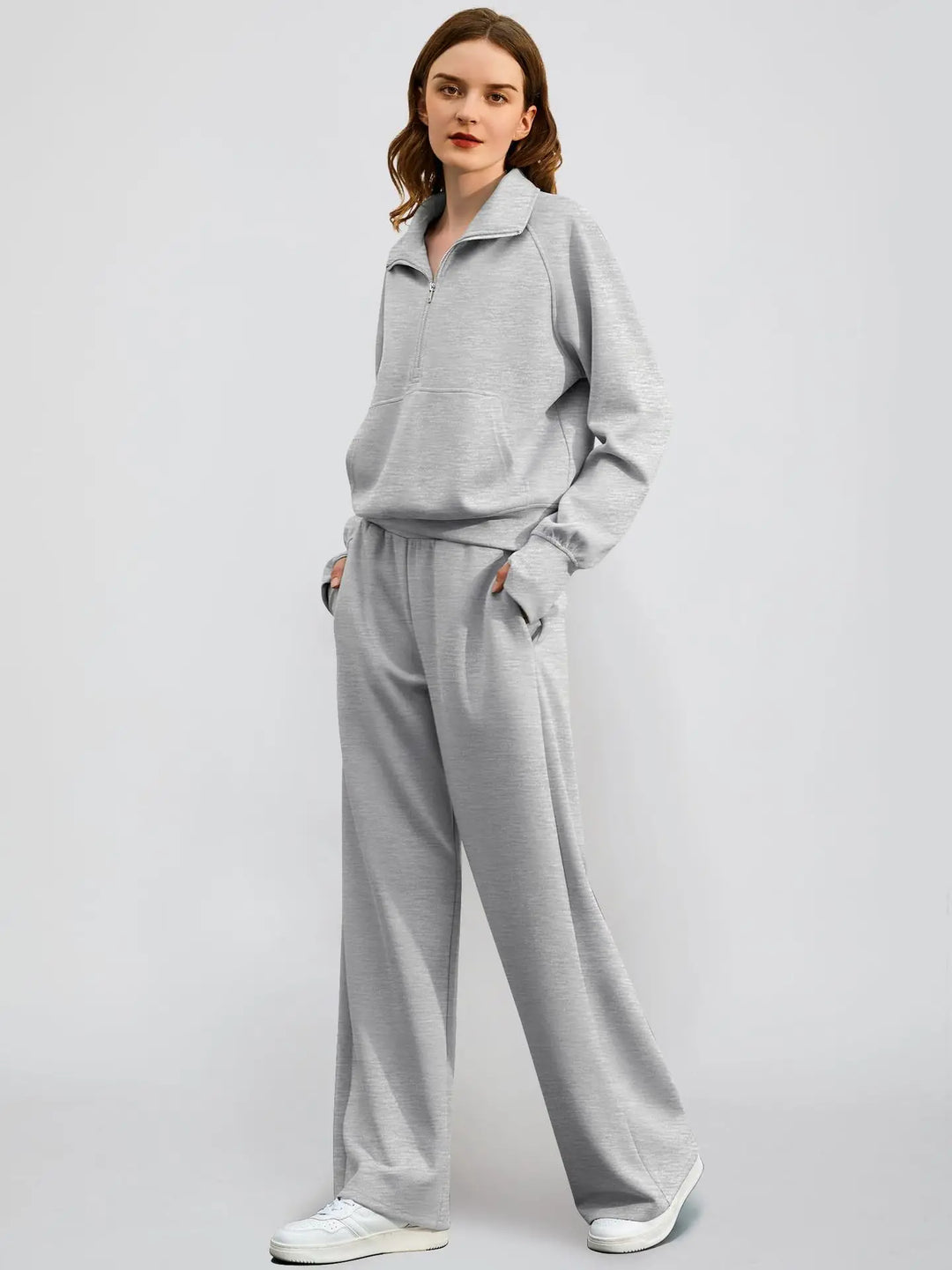 Stylish women's cozy lounge set with a half-zip pullover and flowy wide-leg pants for everyday wear.