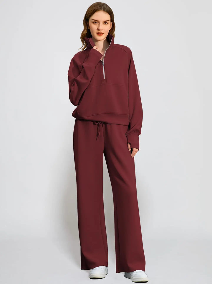 Comfortable women's loungewear set featuring a half-zip top and wide-leg pants for relaxed wear.