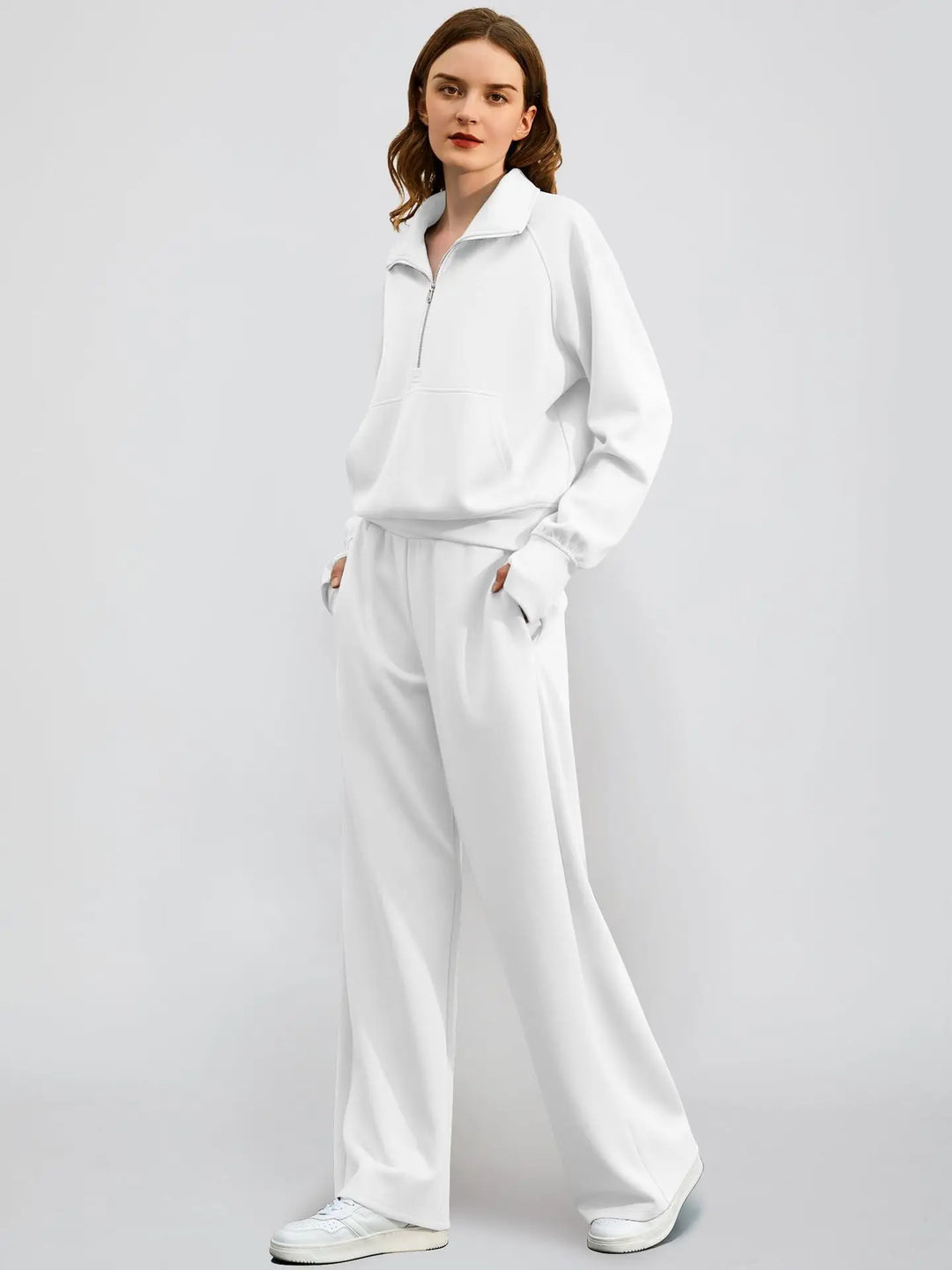 Soft women's two-piece lounge set with a half-zip top and wide-leg pants for ultimate comfort.
