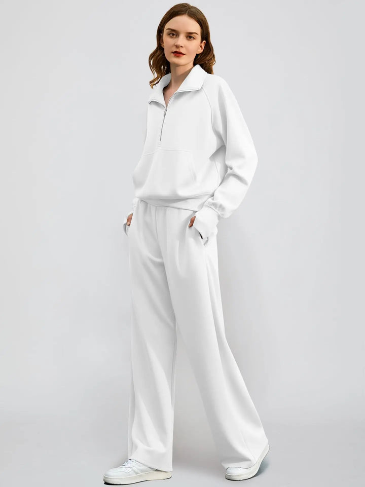 Soft women's two-piece lounge set with a half-zip top and wide-leg pants for ultimate comfort.
