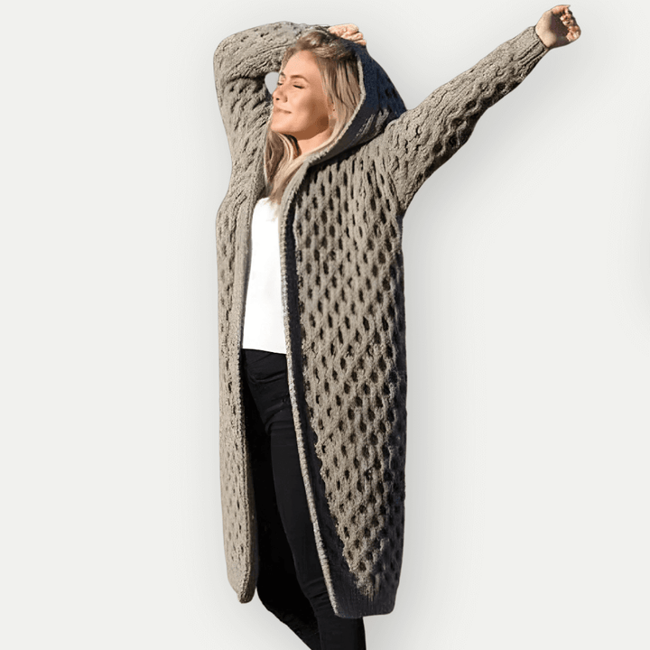 Women's cozy hooded long sleeve zip-up jacket. Comfortable & stylish polyester for everyday fall & winter wear.