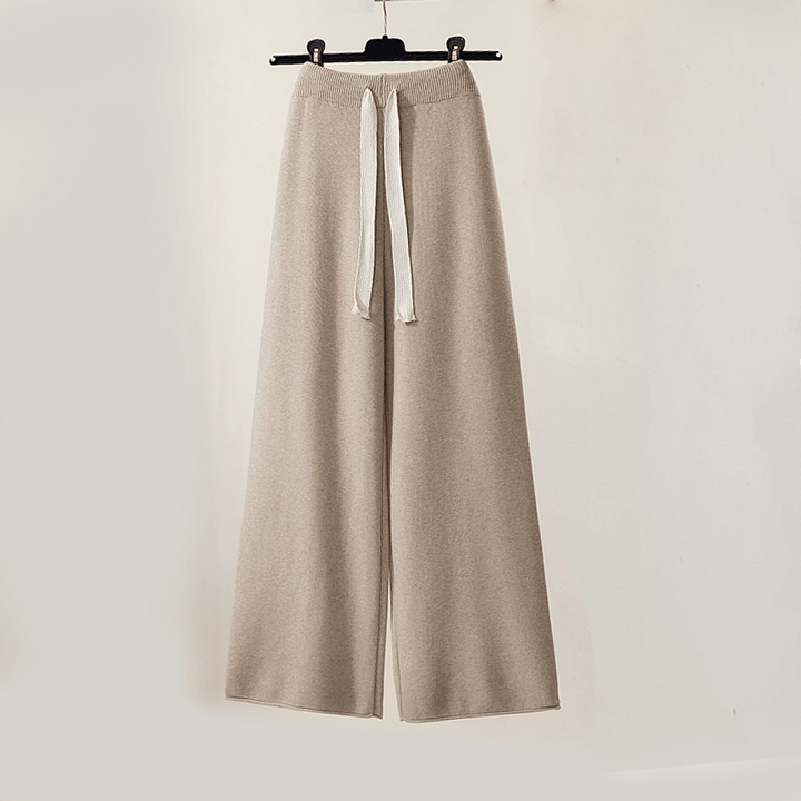 Khaki striped women's loungewear set featuring a cozy sweater and comfortable, relaxed-fit pants.