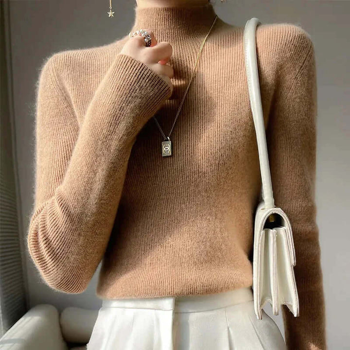 Women's cozy knitted half turtleneck sweater, a soft pullover for effortless winter style.