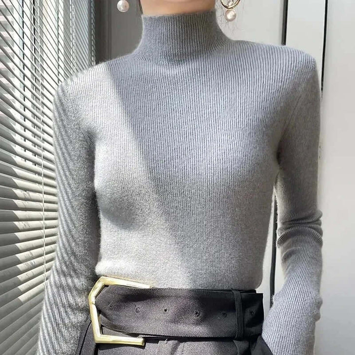 Women's comfortable knitted half turtleneck sweater, a versatile piece for your wardrobe.