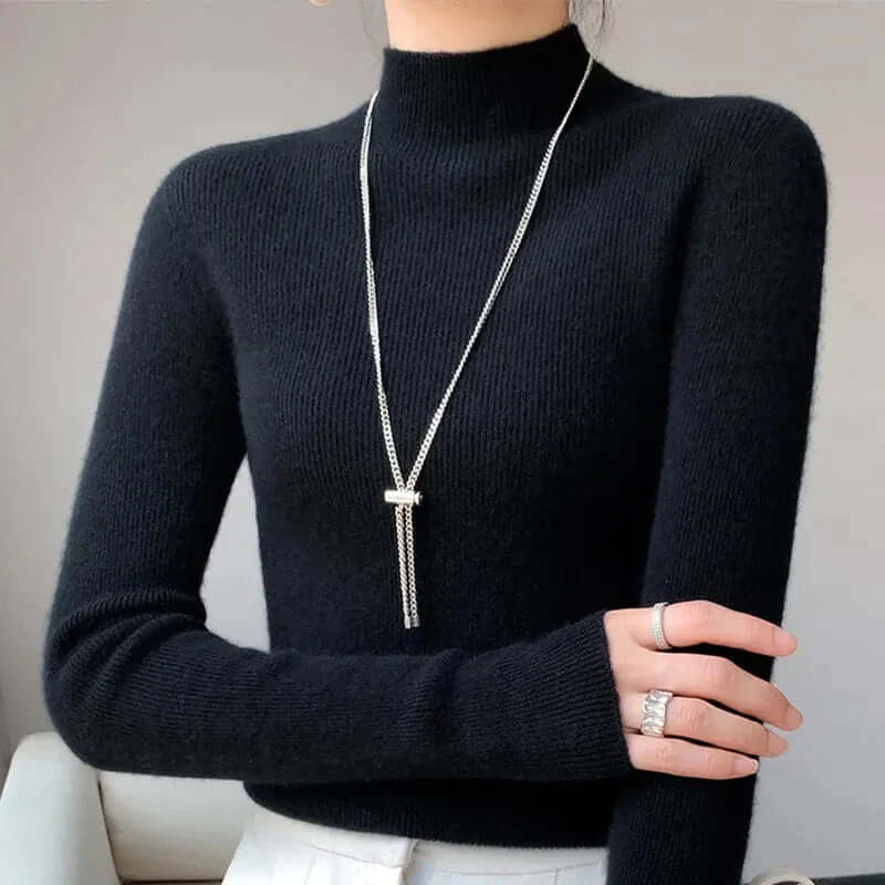 Stylish long sleeve women's knitted sweater with a comfy half turtleneck, ideal for casual wear.