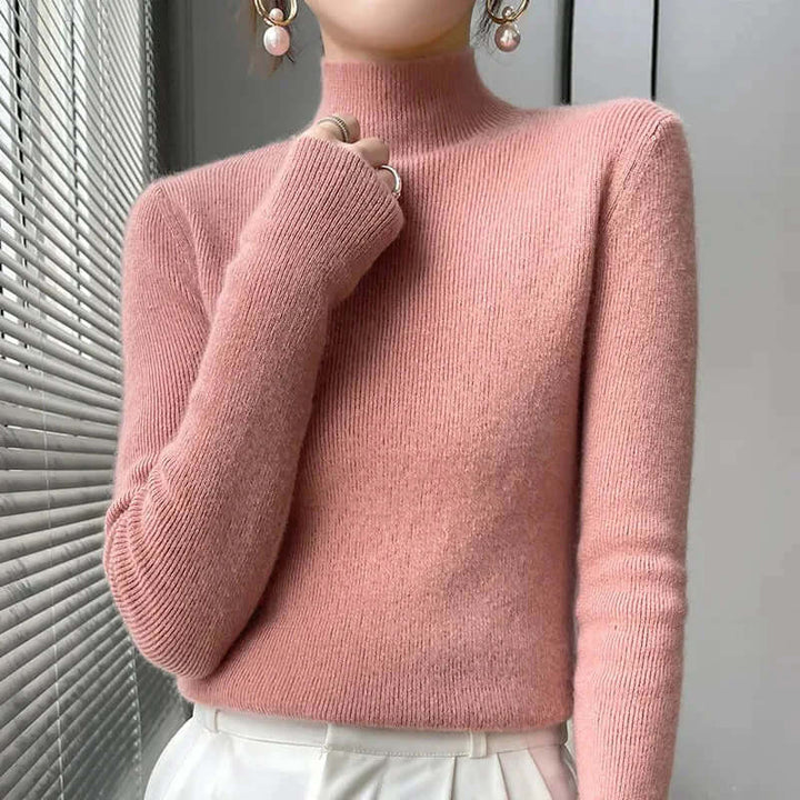 Elegant women's half turtleneck knitted pullover in versatile grey, great for winter fashion.