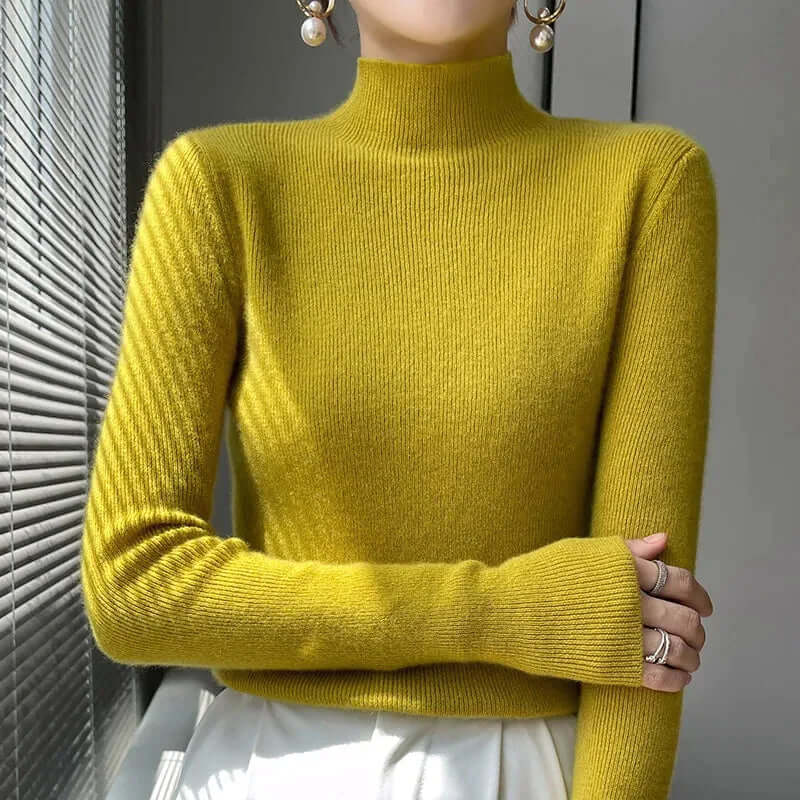 Women's cozy acrylic blend knitted sweater with a stylish half turtleneck for autumn/winter.
