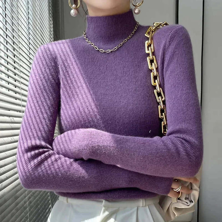 Comfortable women's half turtleneck knitted top, essential for a relaxed and warm look.