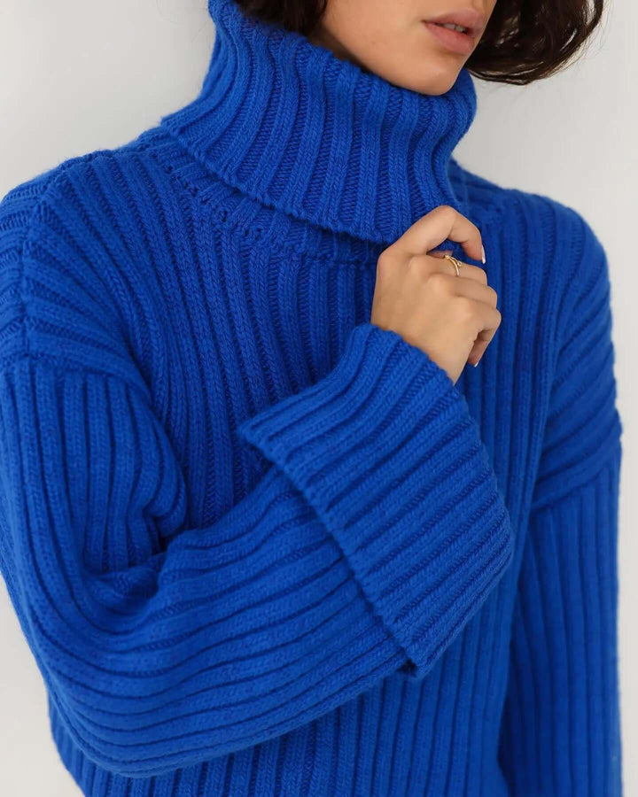Chic women's winter knitted pullover sweater. Versatile for casual or elegant fall fashion looks. Warm & stylish.