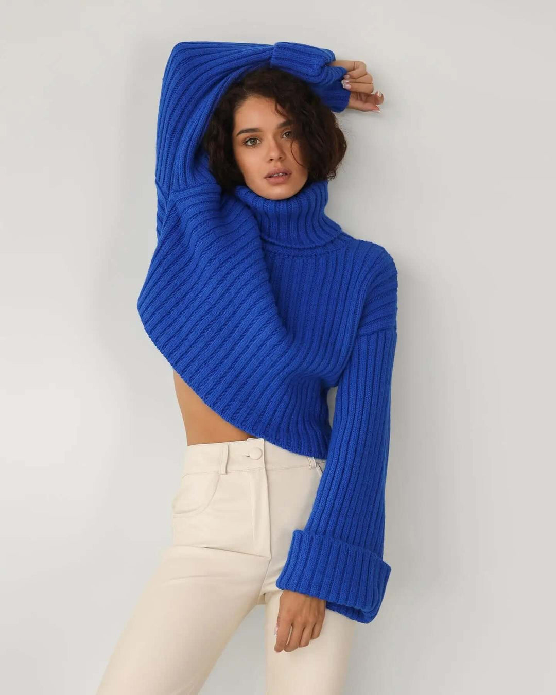 Soft knitted women's winter pullover sweater with long sleeves. Ideal for staying warm and comfortable in cold weather.