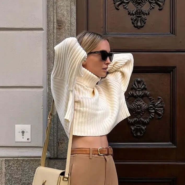 Elegant women's knitted pullover sweater. Cozy long sleeve design, a must-have for winter and fall fashion.