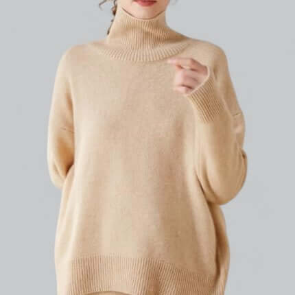 Soft knitted roll neck jumper for women. Cozy long sleeve fit, elegant pullover for winter warmth.