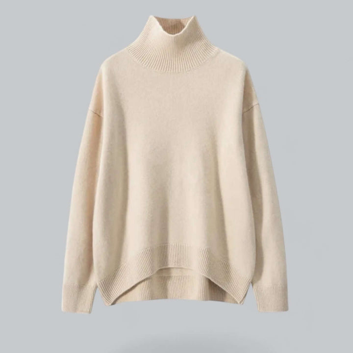 Modern women's knitted roll neck essential. Elegant long sleeve jumper, cozy chic for winter fashion.