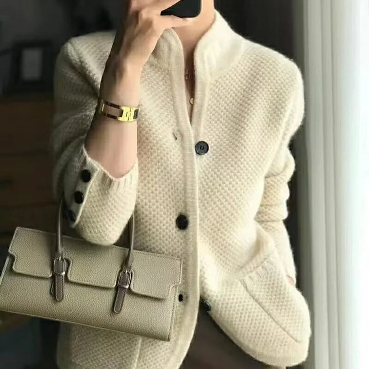 Cozy women's knitted wool cardigan jacket with button-up front, ideal for winter fashion. Soft long-sleeve sweater.