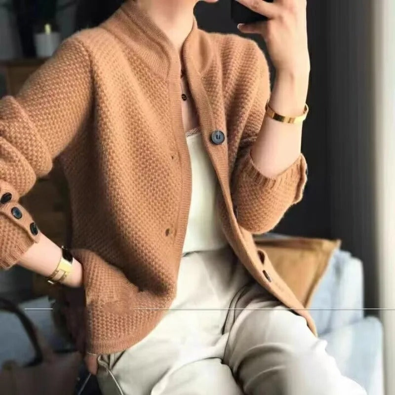 Elegant women's knitted wool button-up cardigan jacket. Stylish long-sleeve ladies' outerwear for cozy winter fashion.