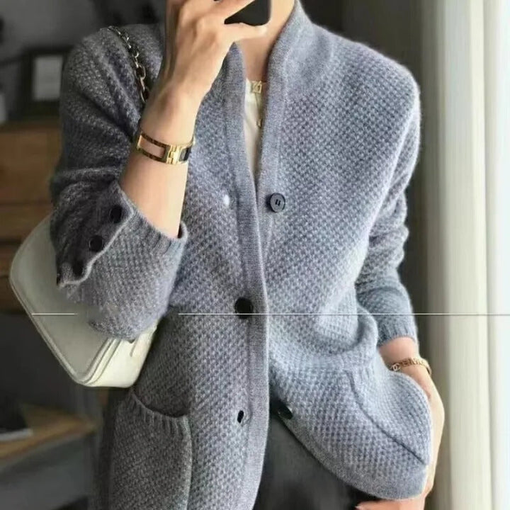 Soft, warm women's knitted wool button-up sweater cardigan jacket. Casual long-sleeve ladies' knitwear for comfort.