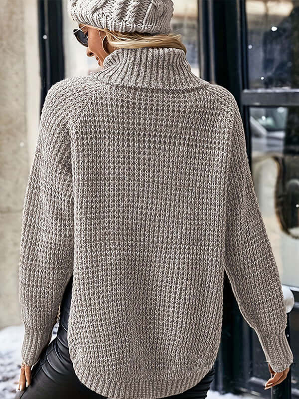 Women's long-sleeve light gray pullover sweater, a comfortable knit turtleneck with raglan sleeves.