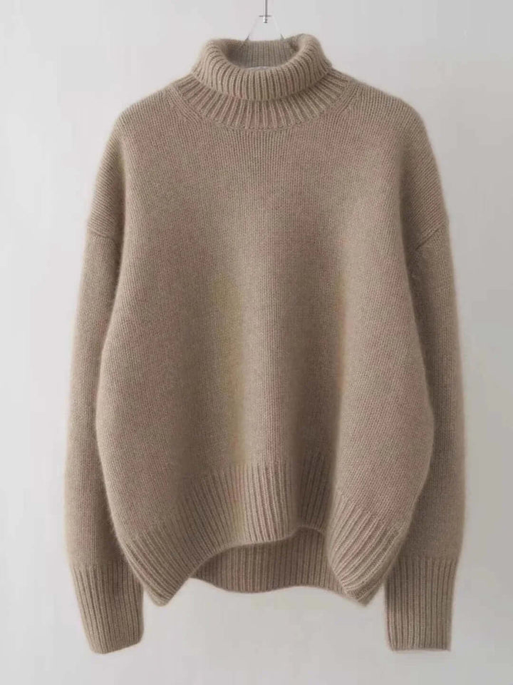 Effortless style with this women's cozy loose fit high neck knit sweater, perfect for relaxed winter fashion.