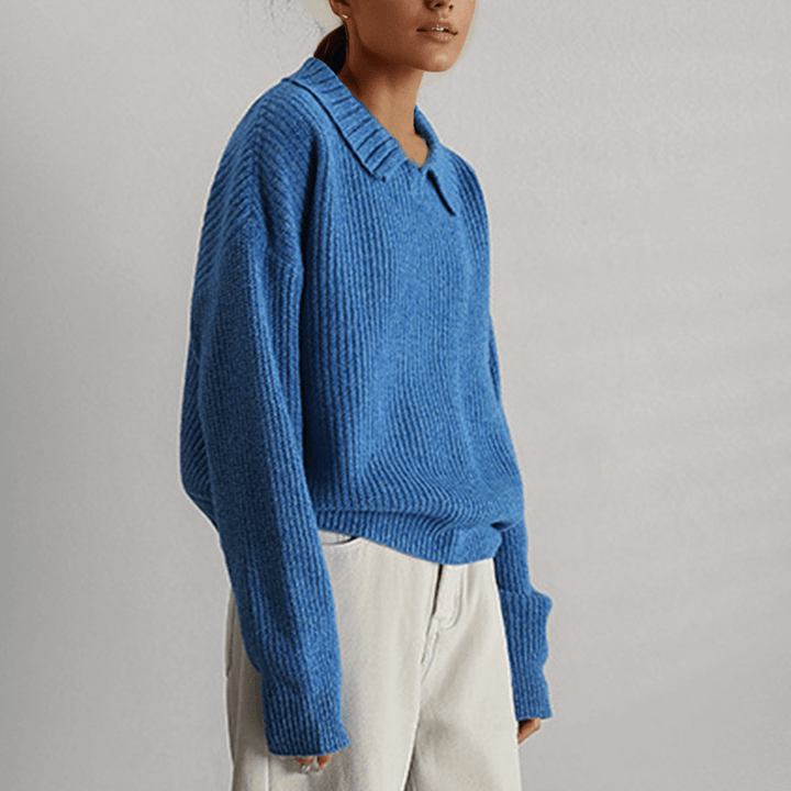 Stylish women's loose fit knitted sweater in a vibrant blue, ideal for versatile everyday casual fashion. Pullover top.