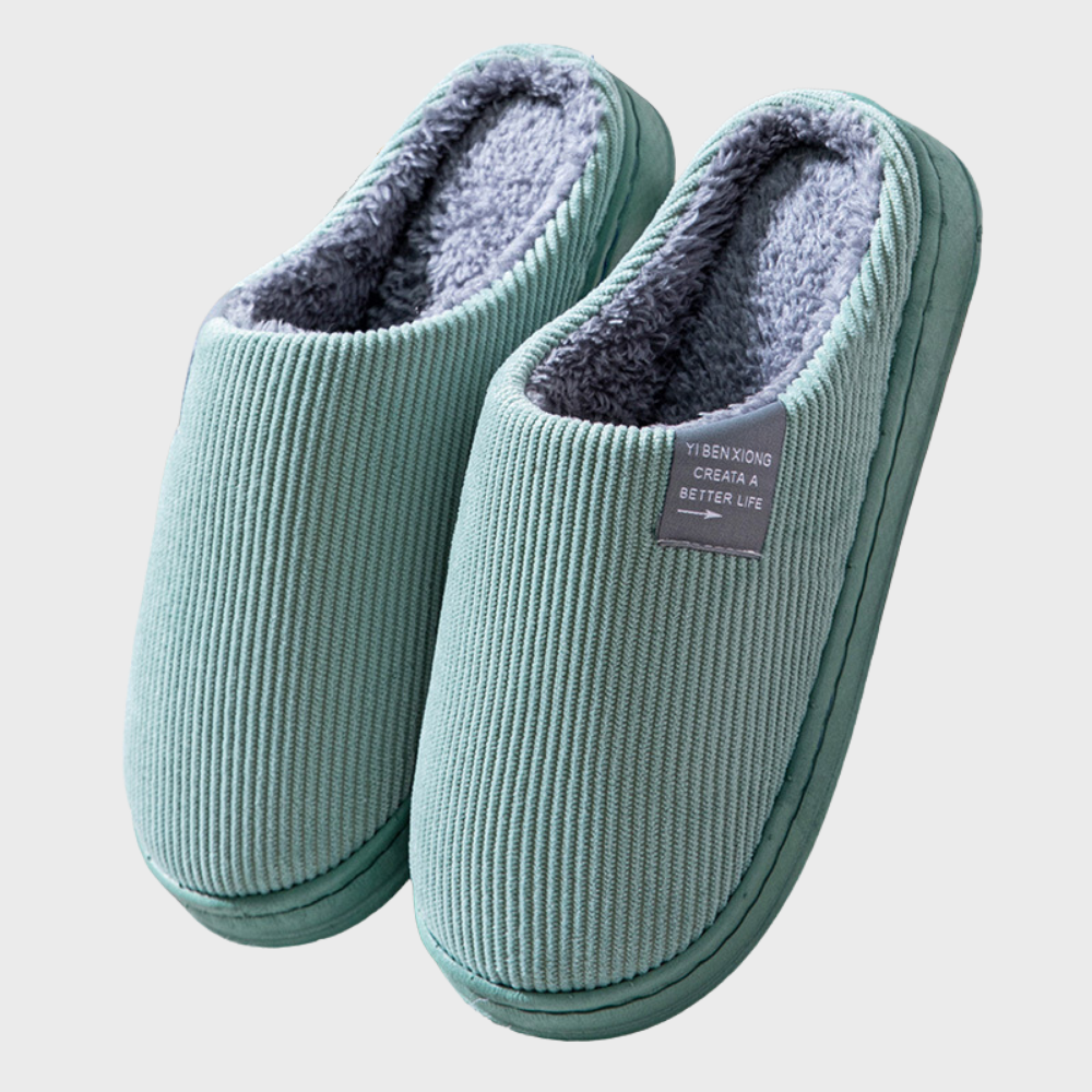 Cozy women's winter slippers, perfect for warm indoor comfort at home. Soft slip-on house shoes.