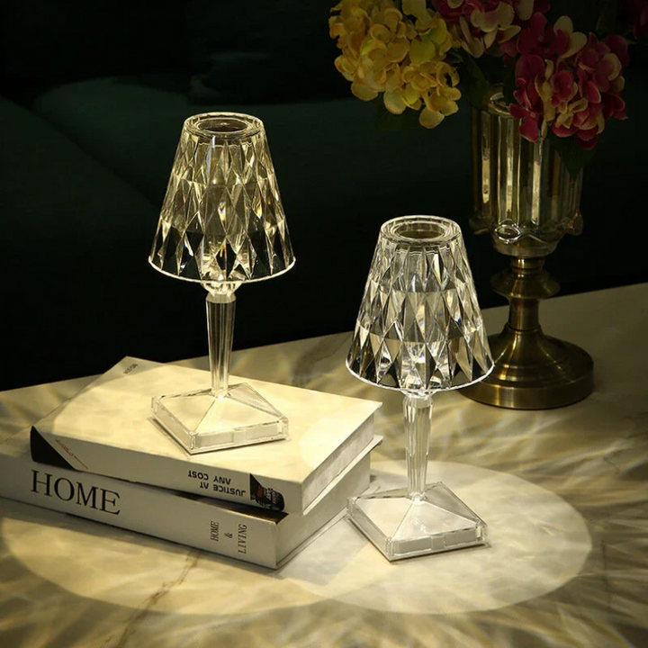 Crystal design table lamp by CrystalLuxe, creating a warm, ambient glow for any space.