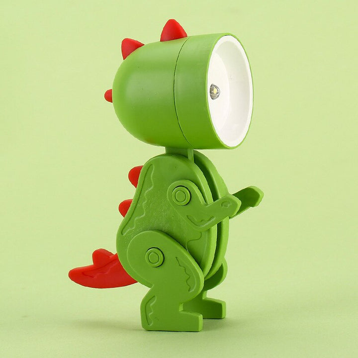 Children's dinosaur bedside lamp, battery operated, perfect for nursery decor.