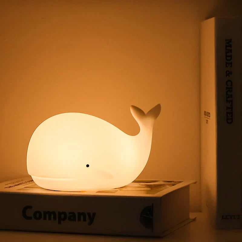 Cute whale night light for kids, soft color changing LED lamp, perfect nursery decor.