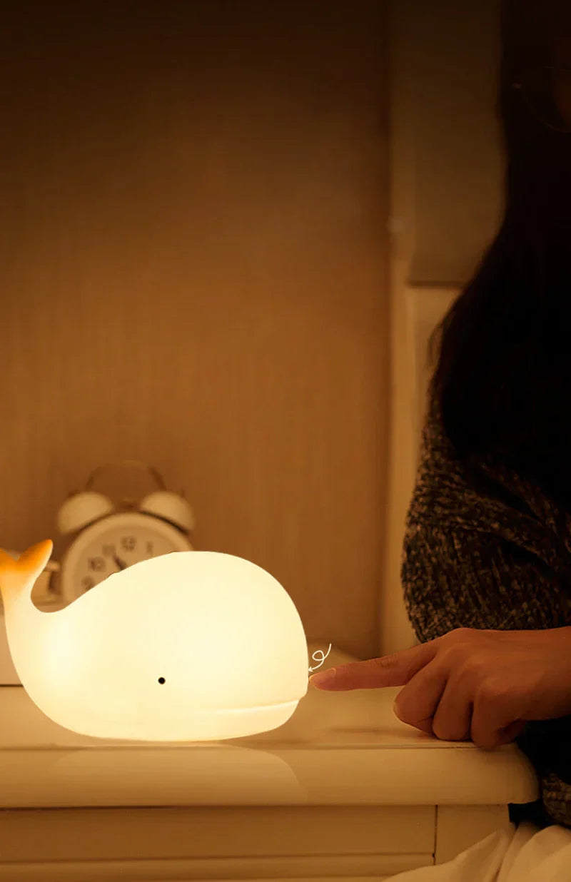 Children's whale night light, soft LED, color changing, creates a calm atmosphere in any nursery.