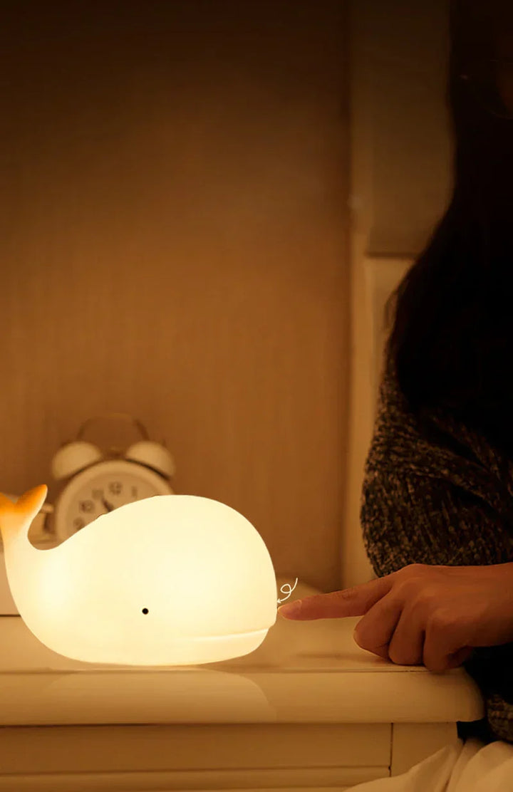 Children's whale night light, soft LED, color changing, creates a calm atmosphere in any nursery.