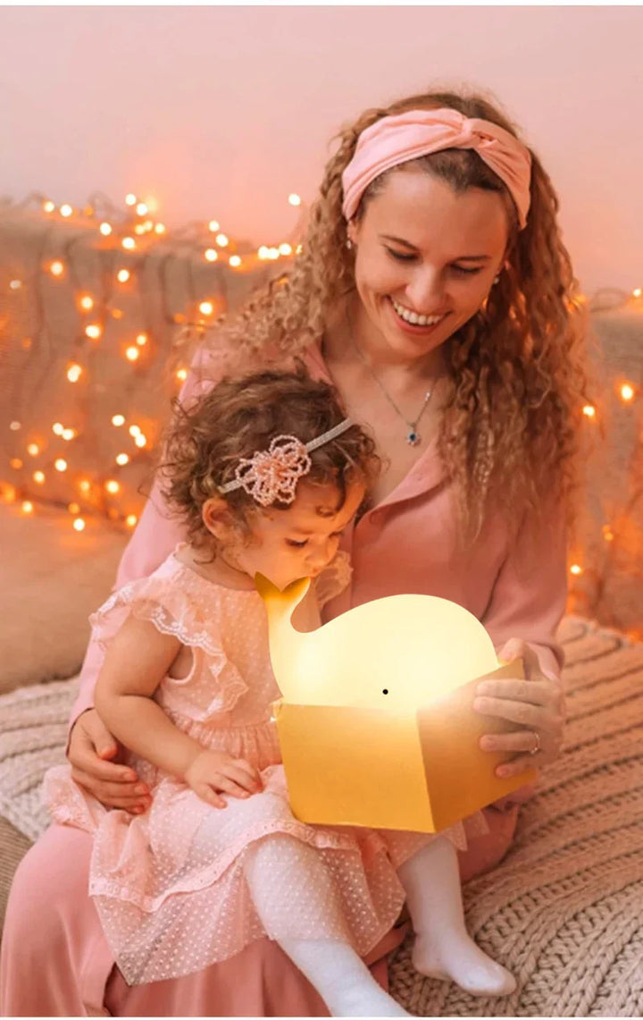 Adorable whale-shaped night light with gentle, color-changing LED glow for kids' rooms.