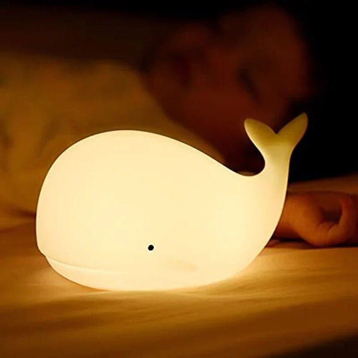 GlowWhale: A cute, touch-controlled silicone whale night light, offering a soft, color-changing glow.