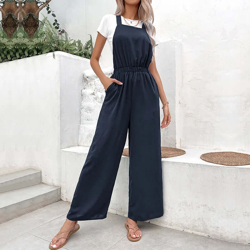 Flowy polyester wide-leg jumpsuit for women, offering effortless comfort and style for summer and spring wear.