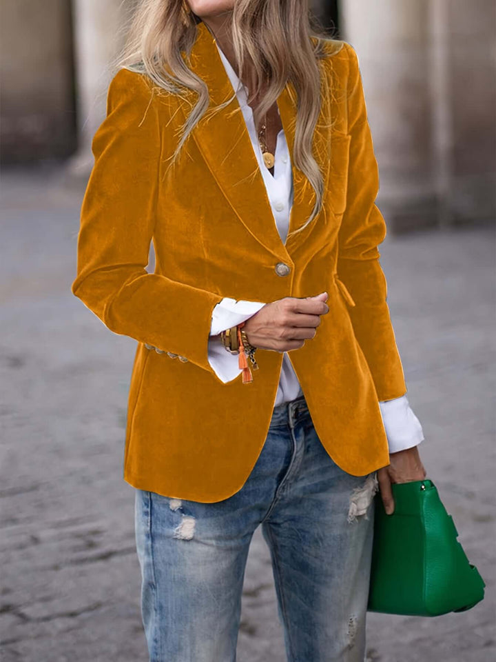 Elegant women's dark green velvet blazer, formal jacket with eye-catching golden buttons.