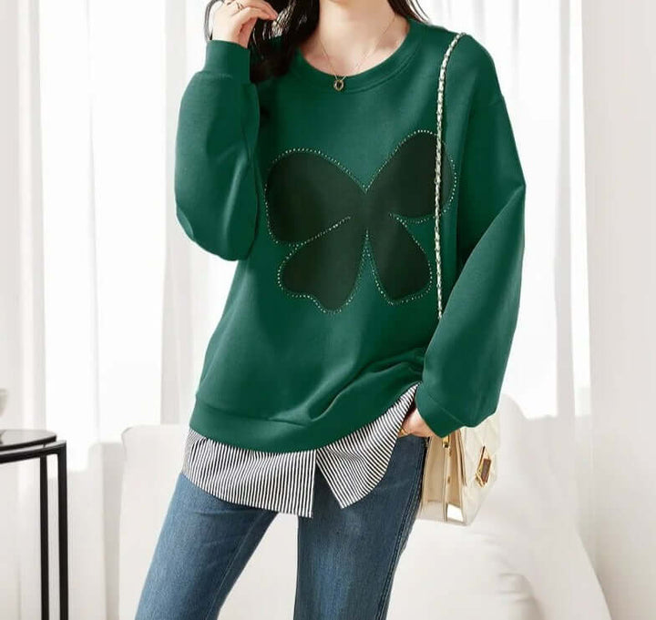 Stylish women's long sleeve rhinestone round neck sweater. Elegant sparkle top, ideal for casual chic fall & winter outfits.