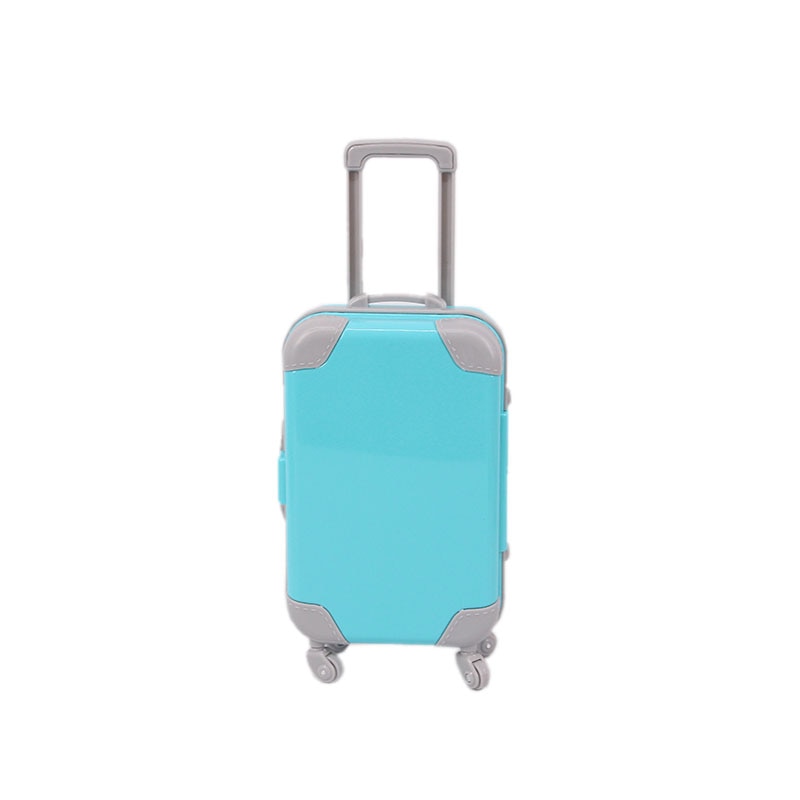 Imaginative play doll suitcase; lightweight, durable mini luggage for kids' travel adventures.